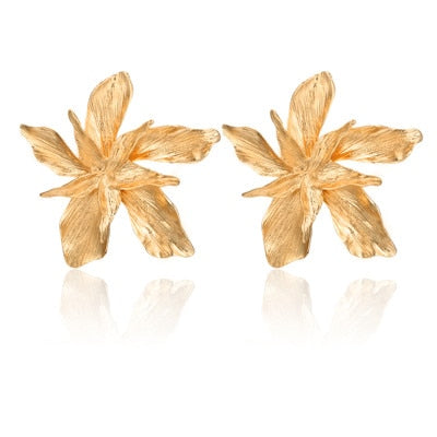 Aretes Flores de la Suerte en Oro