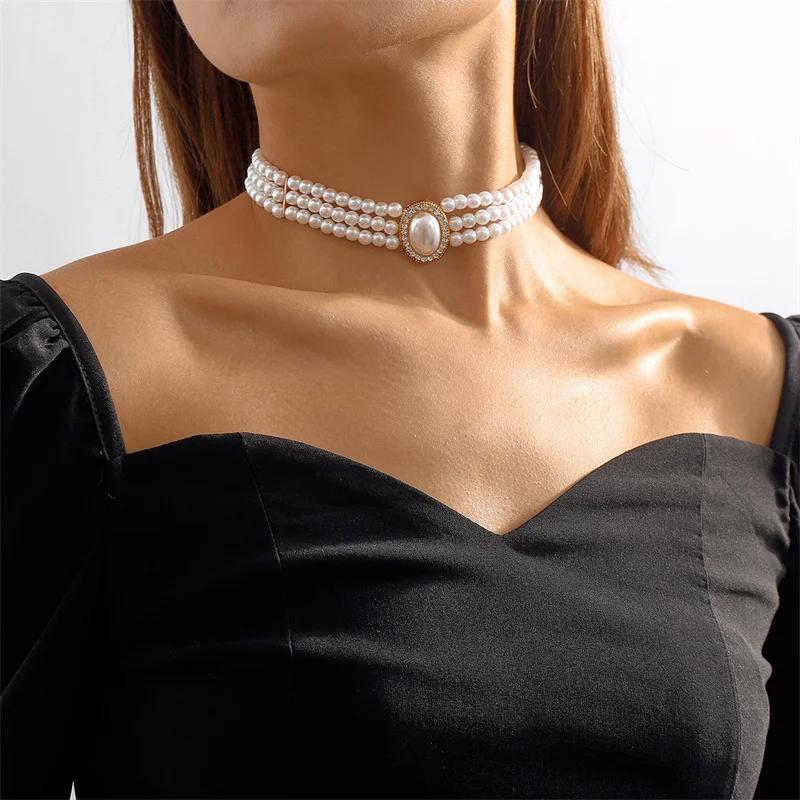 Elegante Collar de Tres Perlas